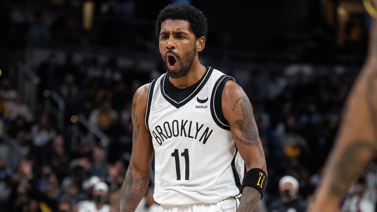 Brooklyn Nets guard Kyrie Irving (11) reacts to a made basket in the second half against the Indiana Pacers.